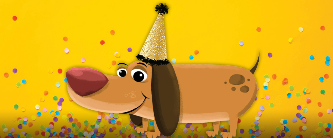 Image of Nosey wearing a party hat and surrounded by confetti