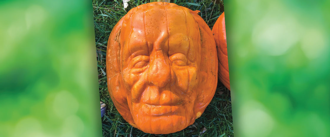Image of a pumpkin with a human-like face on it