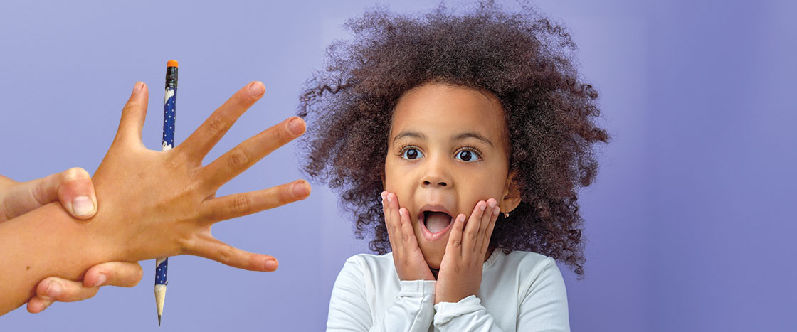 Image of hand and floating pencil with suprised student